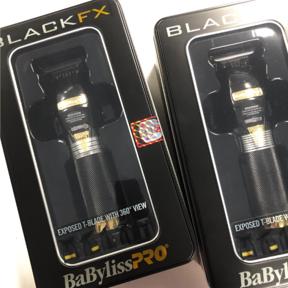 two black and gold men's clippers