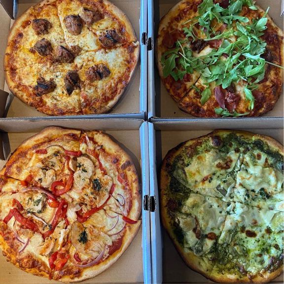 Assortment of fresh pizzas