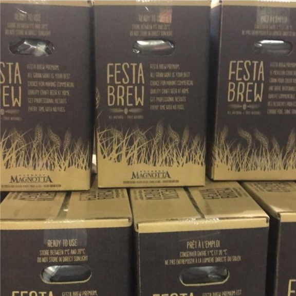 several boxes of festa beer stacked on top of each other.
