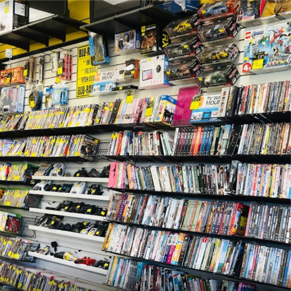 a store filled with lots of different types of video games.