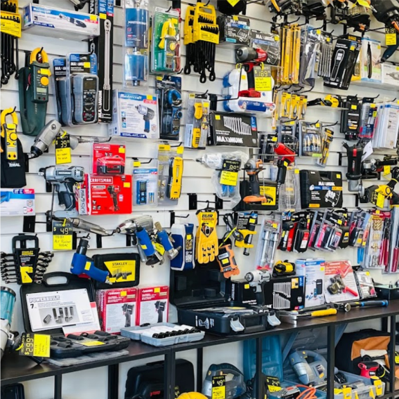 a wall filled with lots of different tools.