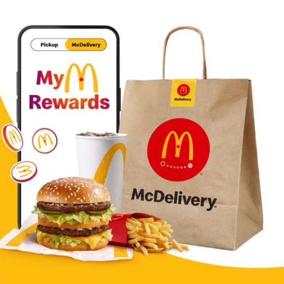 a mcdonalds bag next to a hamburger and fries, offering delivery