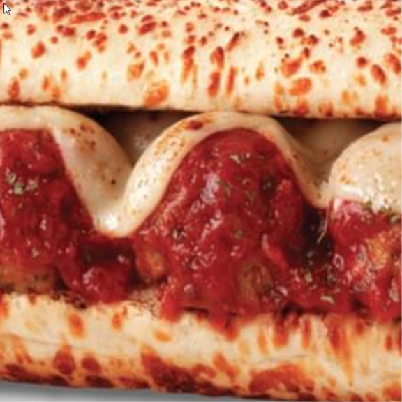 a close up of a sandwich with meatballs and sauce.