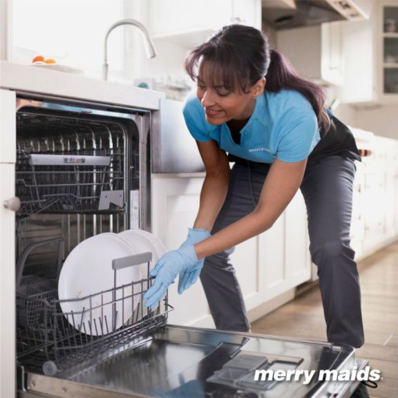 merry maid loading dishwasher