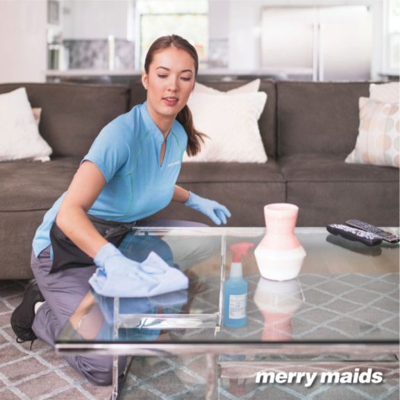 merry maid cleaning coffee table