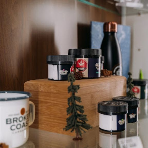 cannabis products on display in wood motif showroom