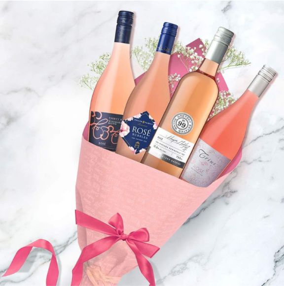 bottles of pink wines arranged in a bouquet