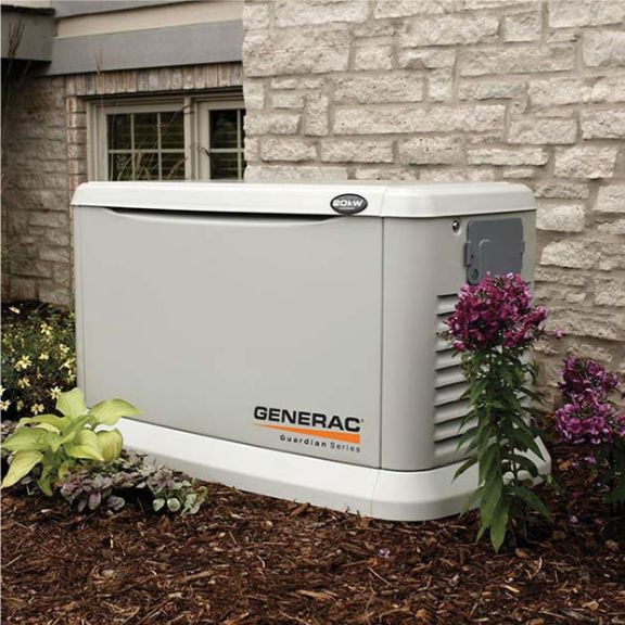 residential generator in the back garden of a house