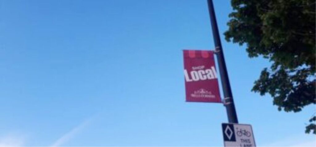 a street sign with the word local on it.