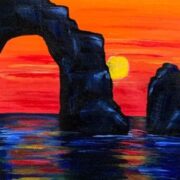 A painting of a sunset with two rocks in the water.
