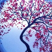 A painting of a tree with red leaves on it.