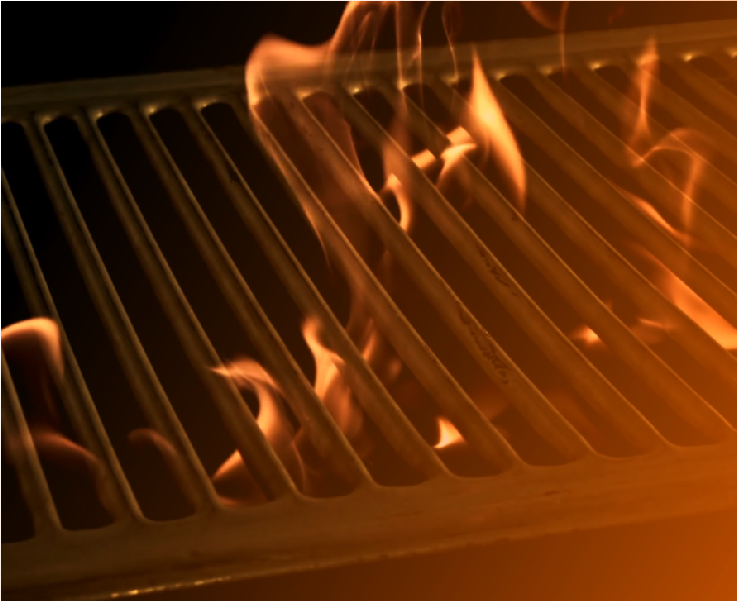 An image of a grill with flames on it.