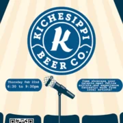 An open mic with a microphone and qr code.