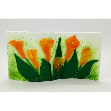 Decorative glass panel depicting orange calla lilies with green leaves on a speckled background, displayed upright.