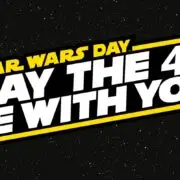 Star wars day graphic with text 'may the 4th be with you' on a black space-themed background with stars.