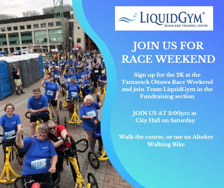 A group of people in blue shirts participate in a race event near a city hall. A banner reads, "Join us for the 2K at the Tamarack Ottawa Race Weekend and join Team LiquidGym in the Fundraising section.