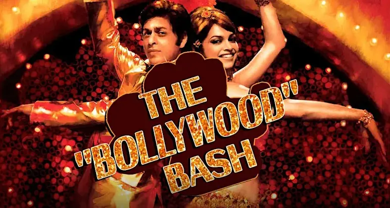 Two performers in golden outfits strike a dance pose beneath a large text reading "THE 'BOLLYWOOD' BASH" with a vibrant background.